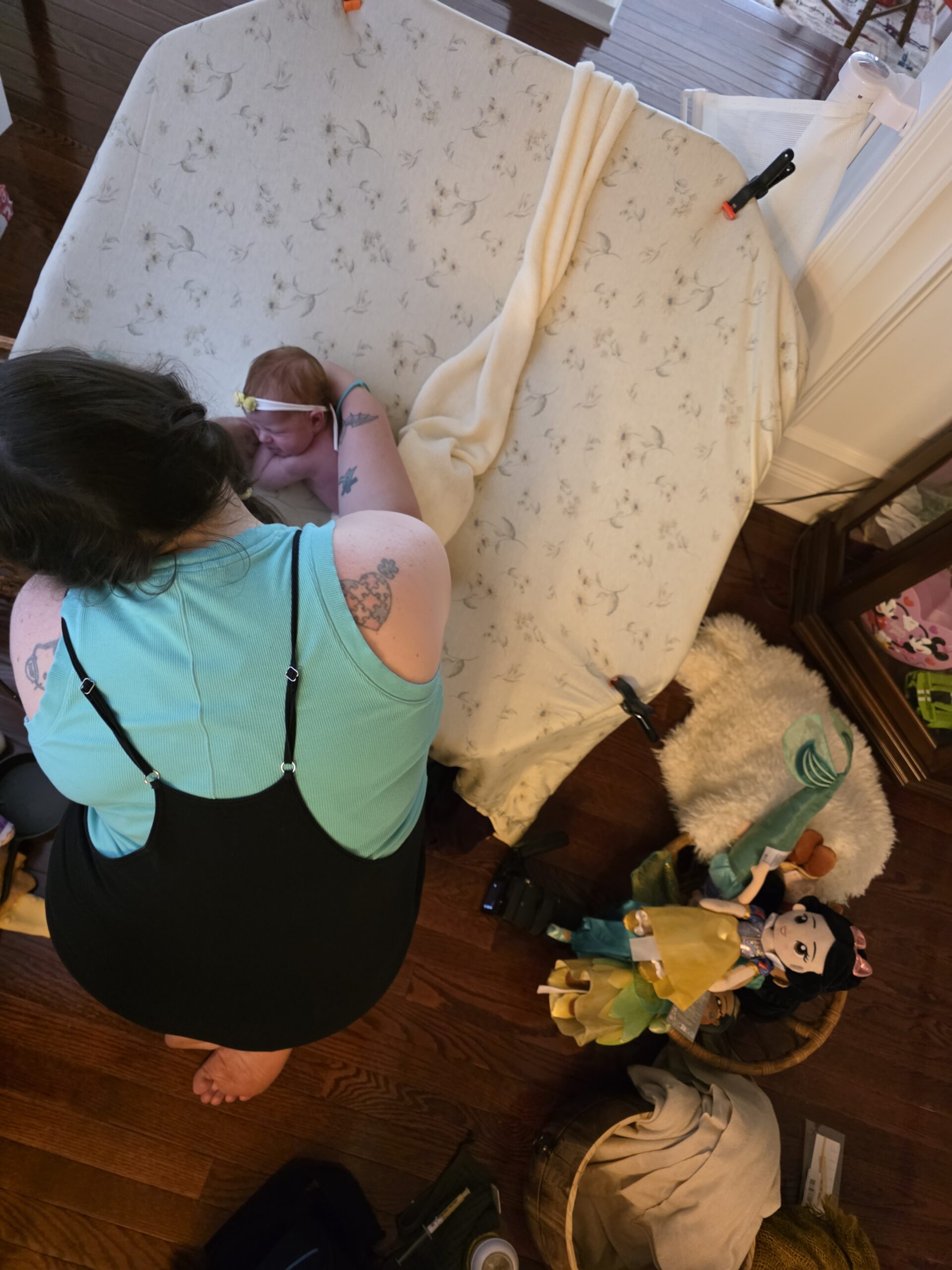 in home newborn photographer during session in Cary, NC