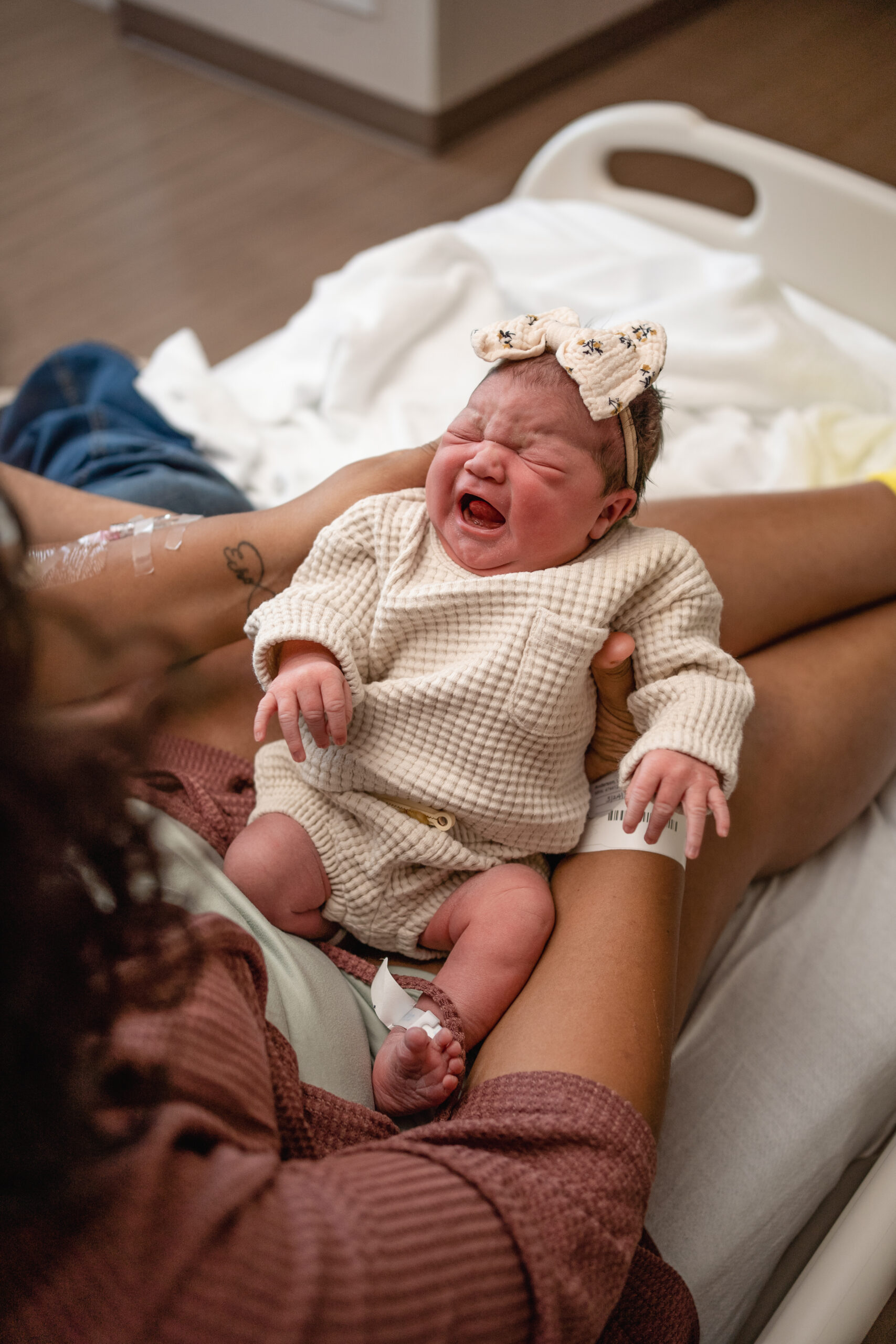 newborn baby just a few days old being photographed during a Fresh 48 session